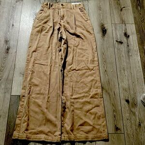 American Eagle jeans that are a size 0, super high rise wide leg with stretch.